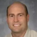 Dr. Andrew David Burrell