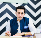 Dr. Maroof Vaince