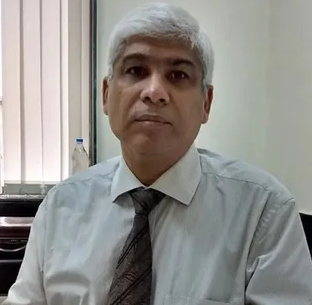 Dr. Kishore Manek
