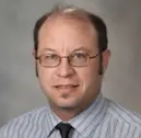 Dr. Lane Andrew Woldum