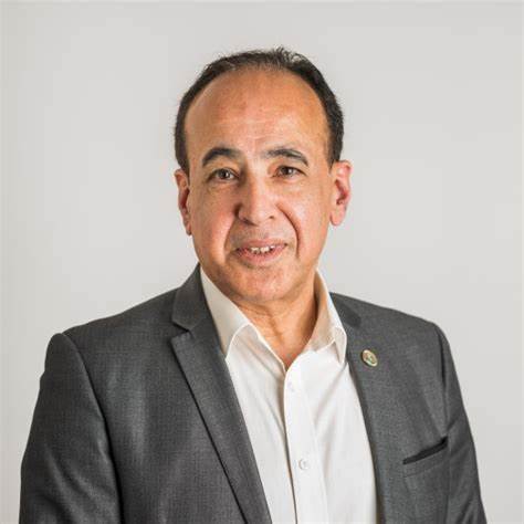Dr. Avtar Raina