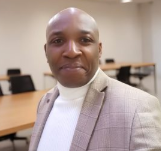 Dr Karl Oluwashemire