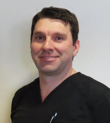 Dr.  Charles Van Zyl